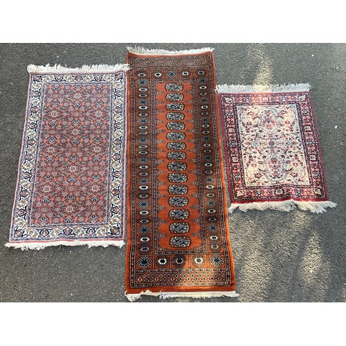 1233 - Carpets & Rugs - a runner, 150cm x 72cm; two others similar, 65cm x 200cm and 65cm x 100cm (3)