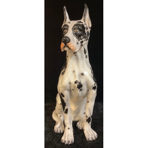 1232 - An Italian floor standing model of a Harlequin Dalmatian dog, mid-20th century, 84cm