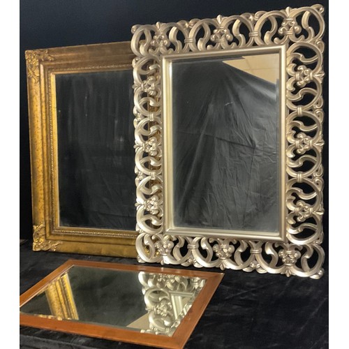 1288 - A contemporary gilt framed wall mirror or looking glass, bevelled plate, 85cm x 116cm; another, orna... 