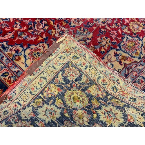 46 - A large Isfaharn rug, approximately 296cm x 385cm