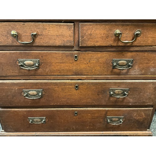 50 - A George III oak chest of two short over three long graduated drawers, brass swan-neck handles, brac... 