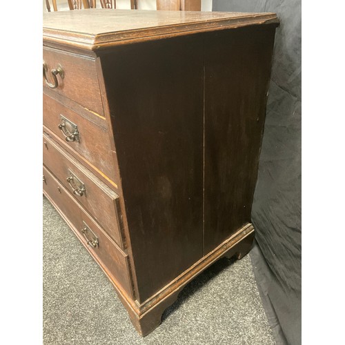 50 - A George III oak chest of two short over three long graduated drawers, brass swan-neck handles, brac... 