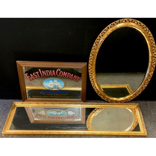 321 - A replica East India Company advertising mirror, rectangular plate, 46cm x 64cm overall;  a  gilt fr... 