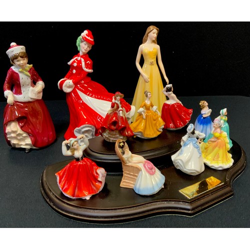 380 - A Royal Doulton figure Best Wishes, Hn 3426;  others Christmas Celebration Hn4721;  Gemini Hn5344;  ... 