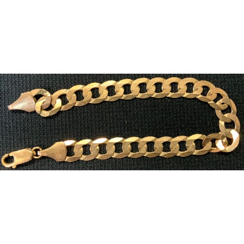 440 - A 9ct gold flat curb link bracelet,20cm long, 10g gross