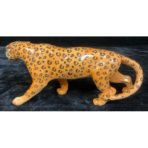 9 - A Beswick model of a leopard, 29cm wide