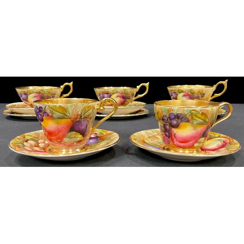 43 - A set of three Aynsley Orchard Gold pattern teacups, saucers and tea plates printed with ripe fruits... 