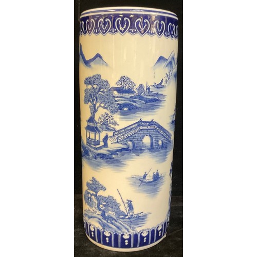 190 - A reproduction Chinese style blue and white transfer printed stick stand, 46cm, late 20th century