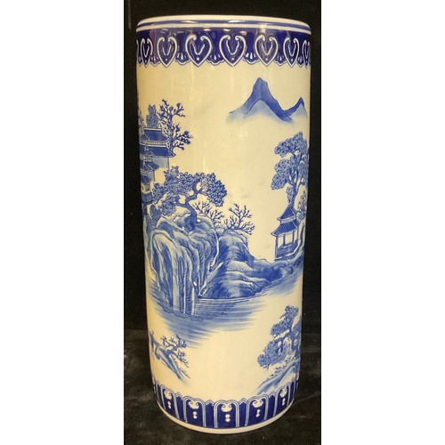 190 - A reproduction Chinese style blue and white transfer printed stick stand, 46cm, late 20th century