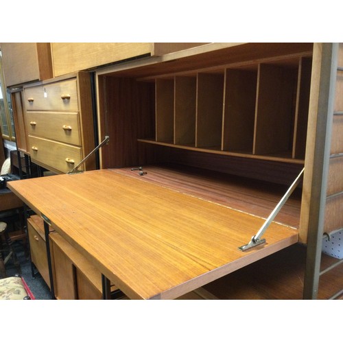 41 - A Staples Ladderax teak furniture shelving and cabinet suite - comprising three drawer unit, three c... 