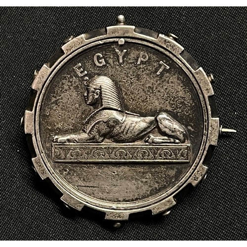 5003 - Victorian Egypt Campaign Medal which has been mounted into a circular cog wheel design frame and bro... 