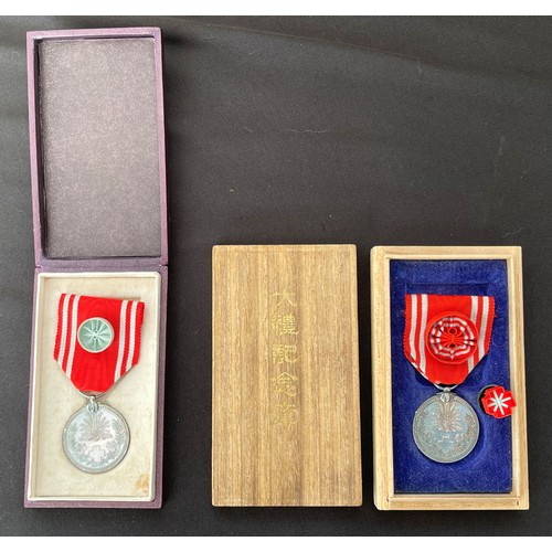 5022 - Pair of cased Japanese Red Cross Medals. (2)