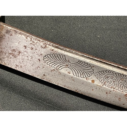 5106 - Indonesian Sword with curved fullered single edged blade 400mm in length, engraved decoration to the... 