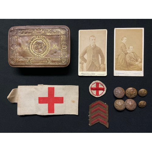 5142 - WW1 British Princess Mary's Gift Tin 1914 containing a Red Cross printed armband, Red Cross badge on... 