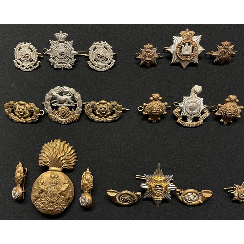 5192 - WW2 British Cap Badges together with matching Collar Dogs to include: Border Regt: Devonshire Regt: ... 