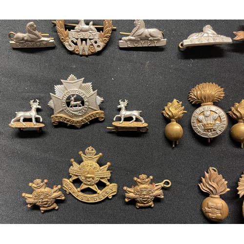 5192 - WW2 British Cap Badges together with matching Collar Dogs to include: Border Regt: Devonshire Regt: ... 