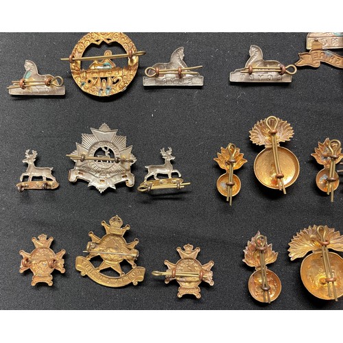 5192 - WW2 British Cap Badges together with matching Collar Dogs to include: Border Regt: Devonshire Regt: ... 