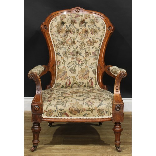 106 - A late Victorian Eastlake Movement spoonback armchair, 93cm high, 70cm wide, the seat 49cm wide and ... 