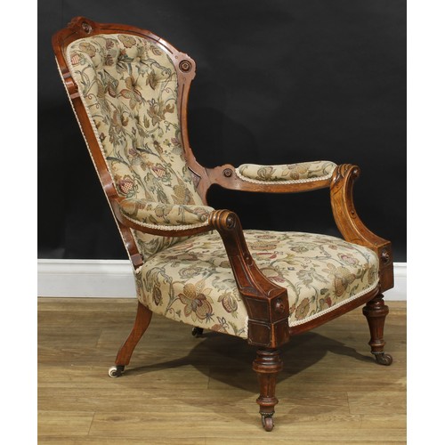 106 - A late Victorian Eastlake Movement spoonback armchair, 93cm high, 70cm wide, the seat 49cm wide and ... 