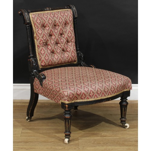 106 - A late Victorian Eastlake Movement spoonback armchair, 93cm high, 70cm wide, the seat 49cm wide and ... 