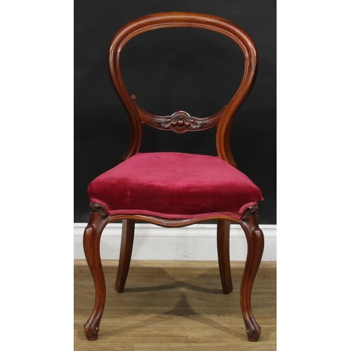 106 - A late Victorian Eastlake Movement spoonback armchair, 93cm high, 70cm wide, the seat 49cm wide and ... 