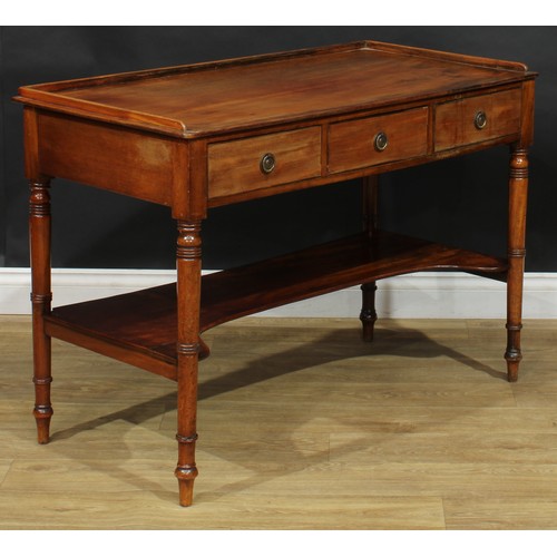 203 - A 19th century mahogany side table, rectangular top with shallow three-quarter gallery above three f... 