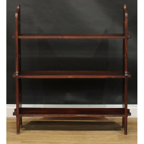 219 - An acacia open bookcase, 106.5cm high, 101cm wide, 20cm deep; a pair of mid-20th century low lamp or... 