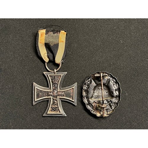 5368 - WW1 Imperial German Iron Cross 2nd Class 1914 makers mark to ring. Complete with a short original ri... 