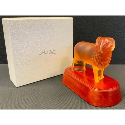 10 - A Lalique Chinese New Year figure, 2003, limited edition, Amber Ram, signed, No 023/13B, boxed, 9.8c... 