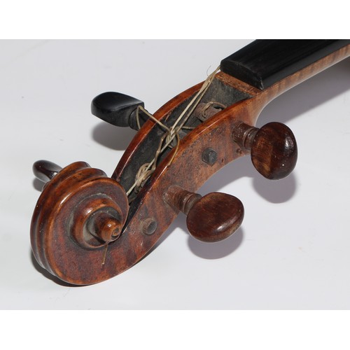 3062 - A 19th century violin, the well figured one-piece back 36cm long excluding button, outlined througho... 