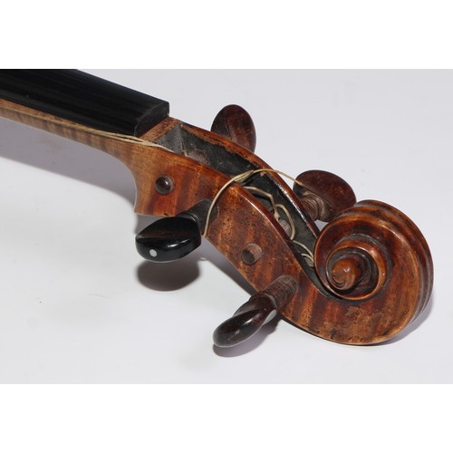 3062 - A 19th century violin, the well figured one-piece back 36cm long excluding button, outlined througho... 