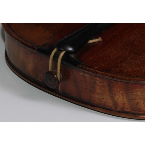 3062 - A 19th century violin, the well figured one-piece back 36cm long excluding button, outlined througho... 