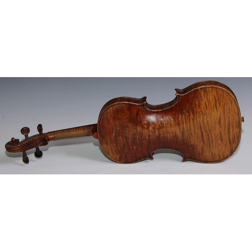 3062 - A 19th century violin, the well figured one-piece back 36cm long excluding button, outlined througho... 