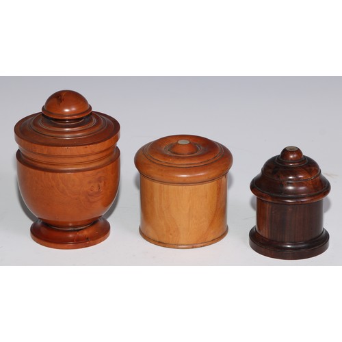 3666 - Treen - a 19th century lignum vitae string box, screw-fitting cover set with a mother of pearl round... 