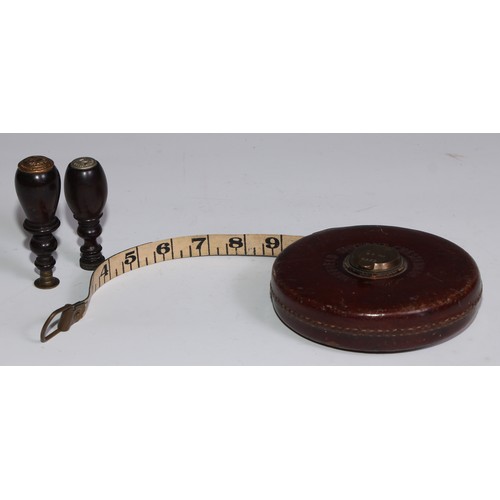 3638 - Railwayana - a mid-20th leather and brass 66ft tape measure, the winder tamped BR (M) [British Railw... 