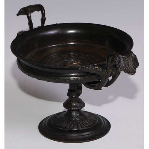 3025 - A 19th century French dark patinated bronze pedestal tazza, cast to the centre with a a relief bust,... 