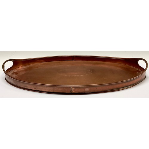 3081 - An Arts and Crafts Newlyn copper two handled oval tray