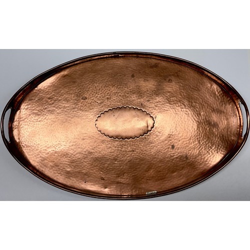 3081 - An Arts and Crafts Newlyn copper two handled oval tray