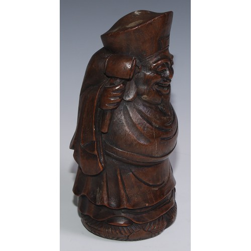 3074 - A Chinese bamboo carving, of Budai carrying a sack, 27.5cm high