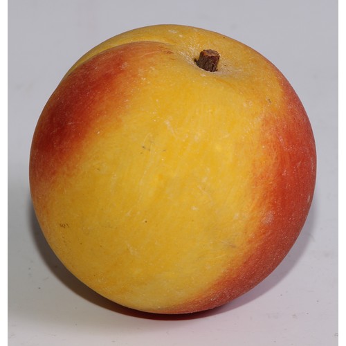 3072 - A carved alabaster peach, naturalistically painted, 7cm high, 19th/early 20th century