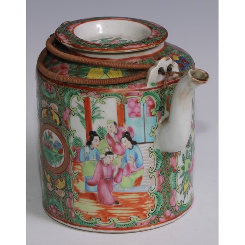 3071 - A Cantonese famille rose tea or wine pot, painted in polychrome enamels with Chinese figures, flower... 