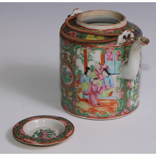 3071 - A Cantonese famille rose tea or wine pot, painted in polychrome enamels with Chinese figures, flower... 