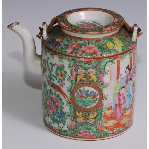 3071 - A Cantonese famille rose tea or wine pot, painted in polychrome enamels with Chinese figures, flower... 