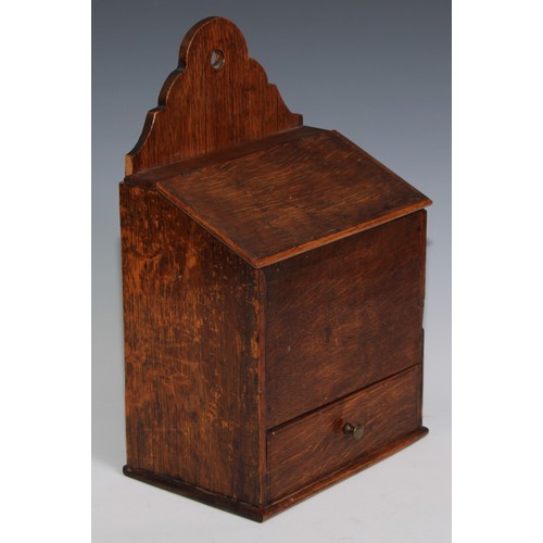 3056 - A 19th century oak salt box, shaped cresting, hinged sloping cover, drawer to base, 35cm high