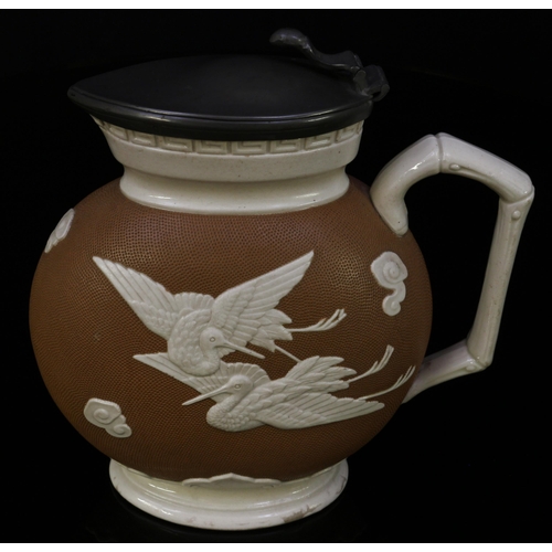 3068 - A Brownfield & Son Aesthetic Movement jug, designed by Dr Christopher Dresser (1834 - 1904), moulded... 