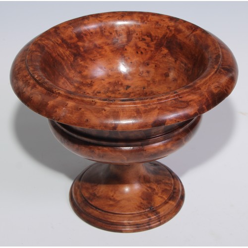 3674 - Treen - a turned burr walnut compressed campana table urn, 21cm diam