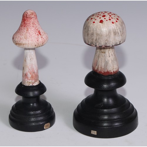 3689 - A painted softwood fungi specimen model, mounted for display, 14.5cm high overall; another (2)