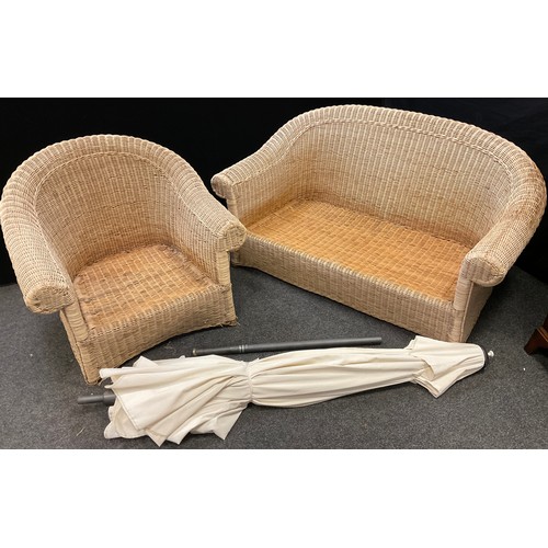 327 - A wicker conservatory or garden suite, comprised of sofa and single armchair, sofa measuring 83cm hi... 