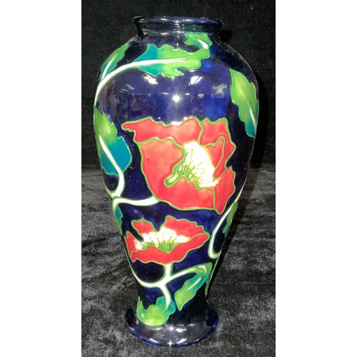 21 - An Anne Rowe inverted baluster Poppy pattern tubelined vase, 27cm high