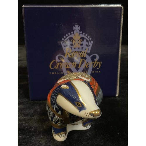 55 - A Royal Crown Derby paperweight, Moonlight Badger, Collector's Guild exclusive, 21st anniversary gol... 